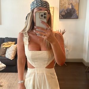 We wore what cream overall jumpsuit. Some minor marks that can easily wash out